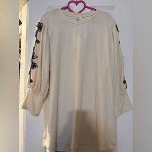 Elegant Cream Blouse with Black Floral Accents